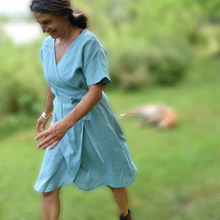 Load image into Gallery viewer, Linen wrap dress with pockets
