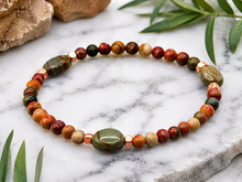 Load image into Gallery viewer, Red Creek Jasper Bracelet with Warm Copper Accents